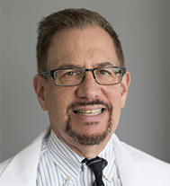 Dr. Arnold Ravick
